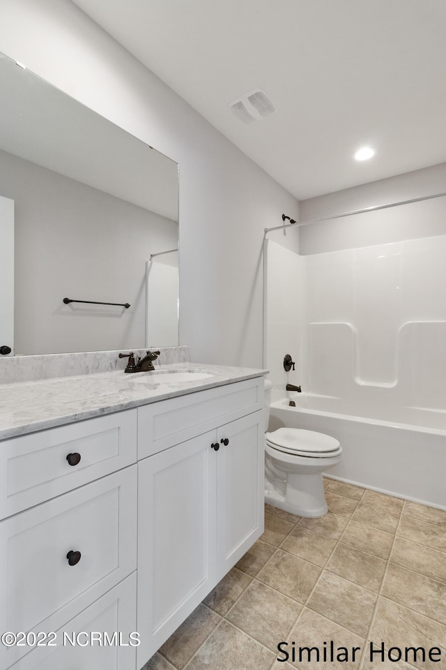 full bathroom featuring tile flooring, vanity, toilet, and tub / shower combination