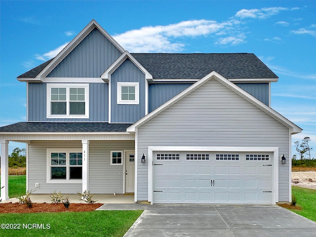 view of front of property featuring a garage