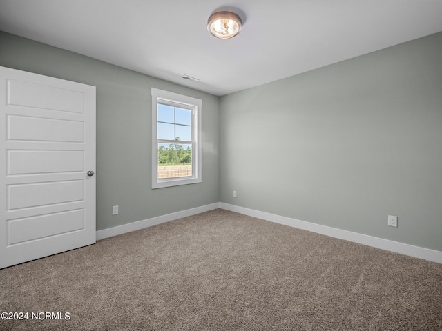 empty room featuring carpet