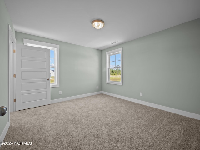 view of carpeted spare room