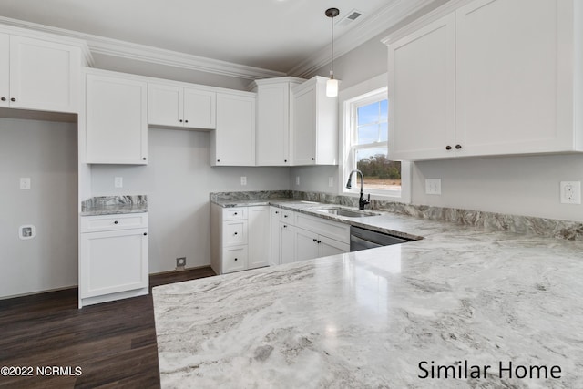 kitchen featuring dark hardwood / wood-style flooring, hanging light fixtures, white cabinets, and sink