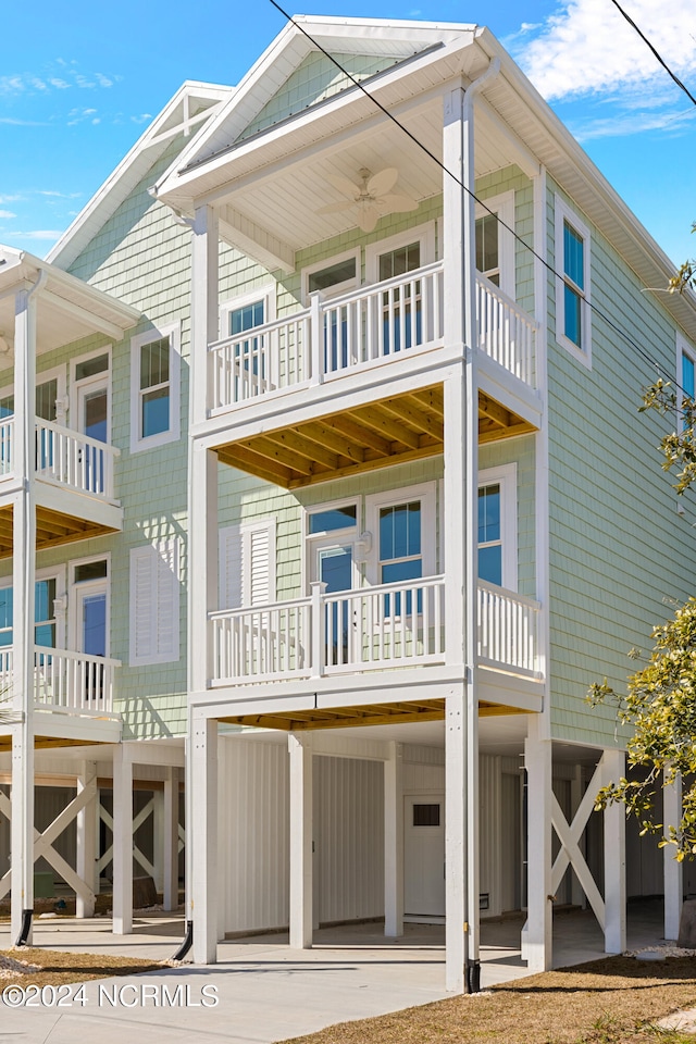 view of front of house with a balcony