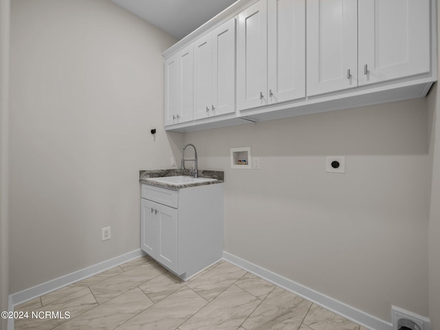 laundry area featuring cabinets, washer hookup, sink, and electric dryer hookup