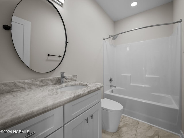 full bathroom with vanity, bathing tub / shower combination, and toilet