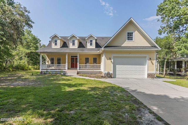 view of front facade featuring a porch, a front lawn, and a garage