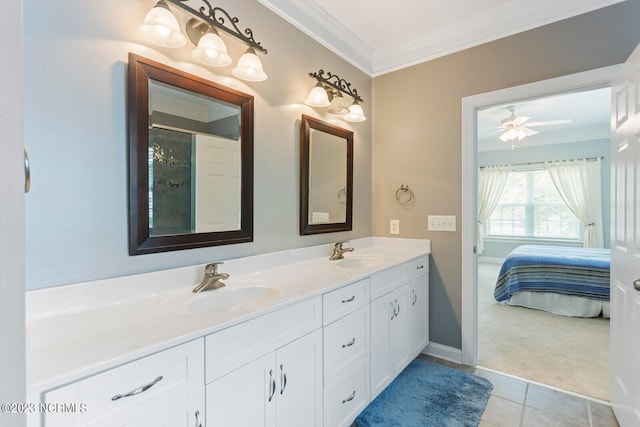 bathroom with ceiling fan, ornamental molding, dual sinks, tile flooring, and oversized vanity