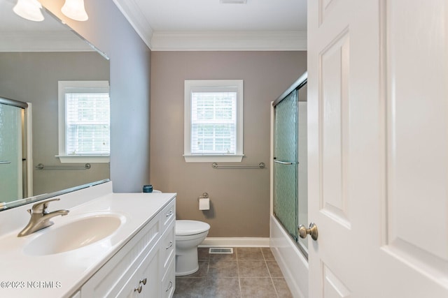 full bathroom with crown molding, toilet, enclosed tub / shower combo, large vanity, and tile floors