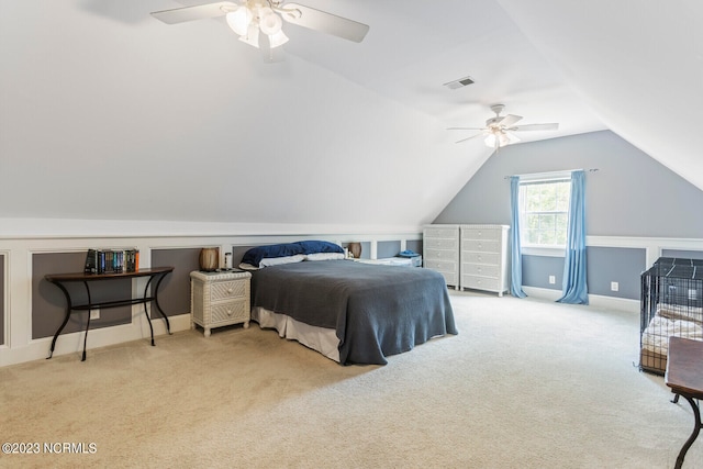 carpeted bedroom featuring ceiling fan and lofted ceiling