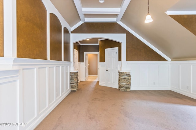 bonus room featuring light carpet and vaulted ceiling