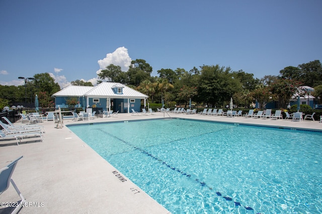 view of pool featuring a patio