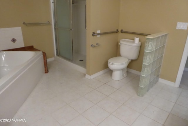 bathroom featuring toilet, independent shower and bath, and tile flooring