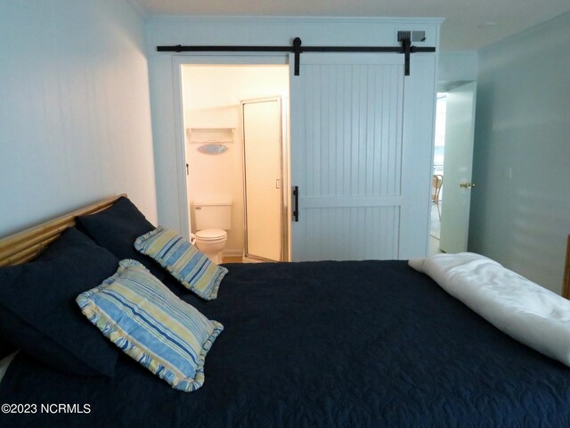 bathroom with an enclosed shower, a textured ceiling, crown molding, and toilet