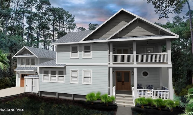 view of front of house featuring a porch and a balcony