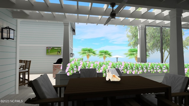 view of patio / terrace with a pergola, outdoor dining space, and a wooden deck