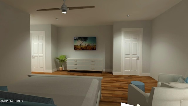living room with wood finished floors, ceiling fan, baseboards, and recessed lighting