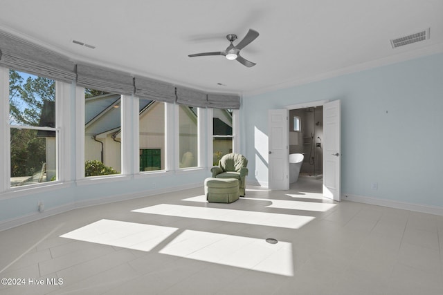 interior space with ceiling fan