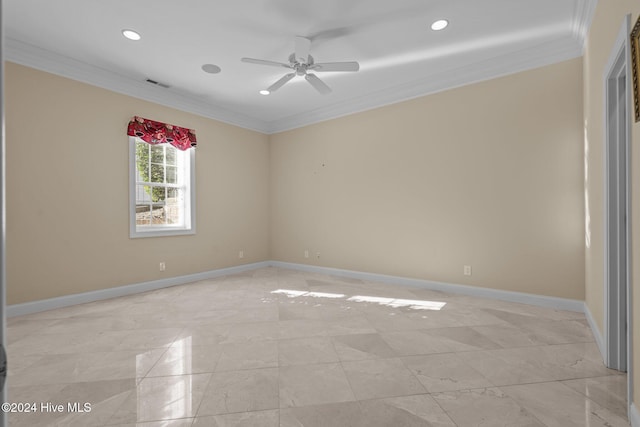 unfurnished room with ceiling fan and ornamental molding