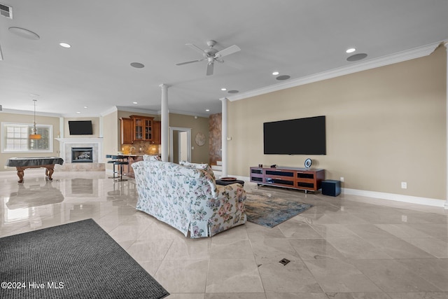 living room with ceiling fan, ornamental molding, and billiards