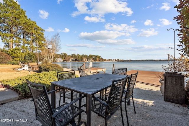 view of patio with a water view