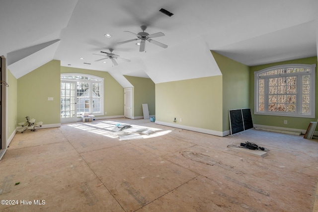 additional living space with vaulted ceiling and ceiling fan