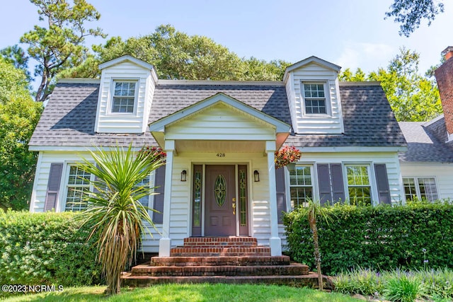 view of new england style home