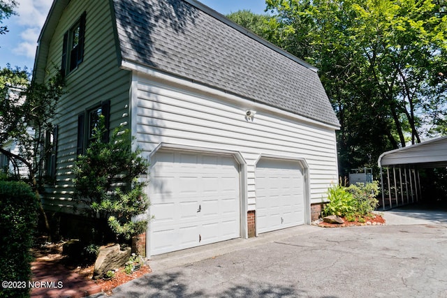 garage with a carport