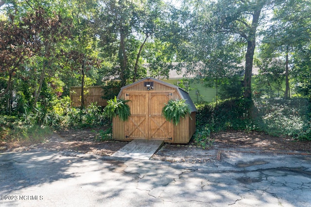 exterior space featuring a storage unit