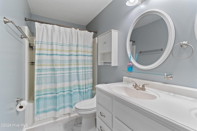 full bathroom with vanity, toilet, a textured ceiling, and shower / tub combo with curtain