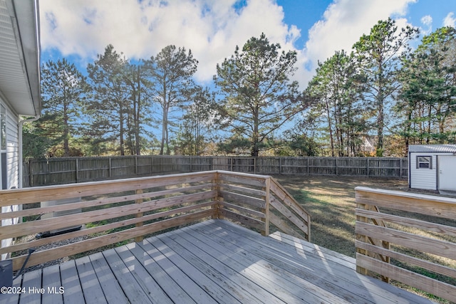 deck with a shed