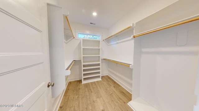 2090 Greenside Manor Dr Unit L-39, Ocean Isle Beach, NC 28469 - walk in closet featuring light wood finished floors