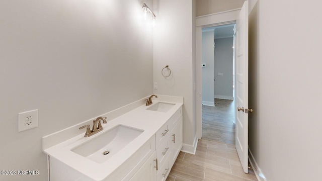 2090 Greenside Manor Dr Unit L-39, Ocean Isle Beach, NC 28469 - bathroom with double vanity and baseboards