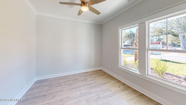 2090 Greenside Manor Dr Unit L-39, Ocean Isle Beach, NC 28469 - unfurnished room featuring healthy amount of natural light, crown molding, light wood finished floors, and a ceiling fan