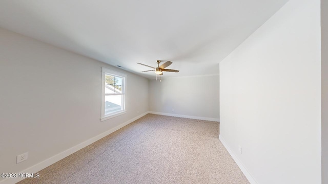 2090 Greenside Manor Dr Unit L-39, Ocean Isle Beach, NC 28469 - empty room with light carpet and a ceiling fan