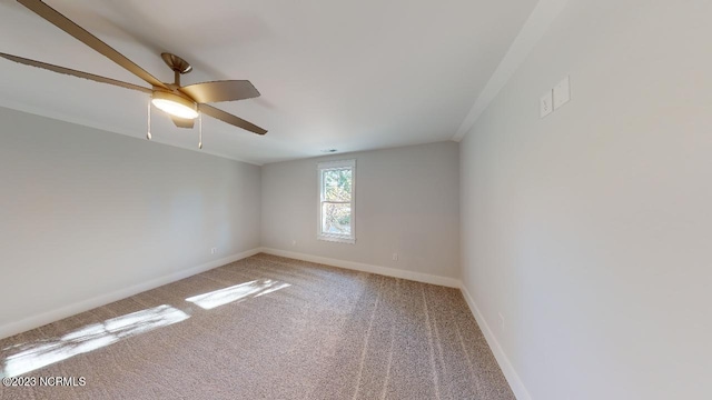 2090 Greenside Manor Dr Unit L-39, Ocean Isle Beach, NC 28469 - carpeted empty room with ceiling fan and baseboards