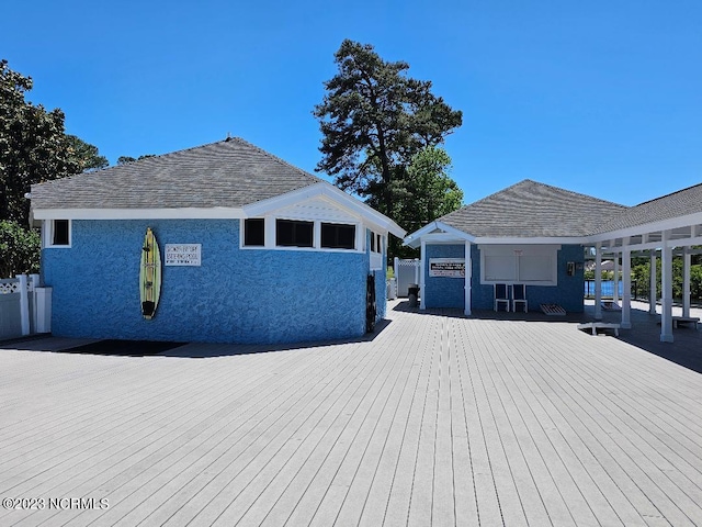 2090 Greenside Manor Dr Unit L-39, Ocean Isle Beach, NC 28469 - view of home's exterior featuring a wooden deck