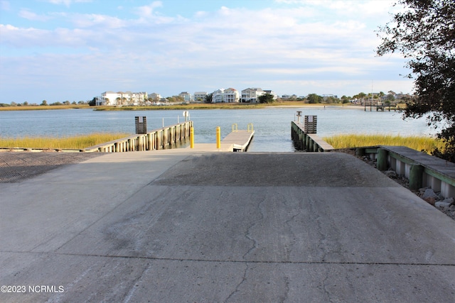 2090 Greenside Manor Dr Unit L-39, Ocean Isle Beach, NC 28469 - dock with a boat ramp and a water view