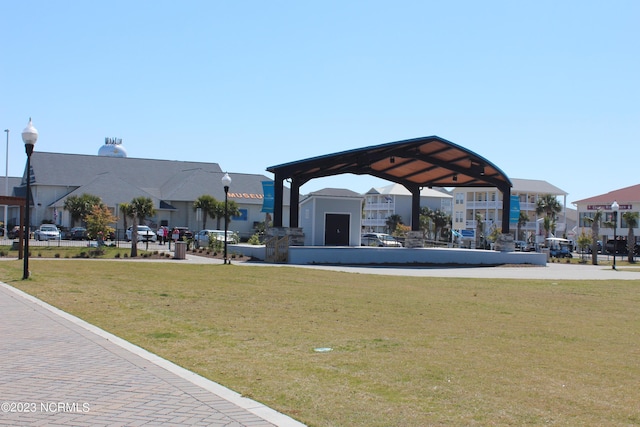 2090 Greenside Manor Dr Unit L-39, Ocean Isle Beach, NC 28469 - view of community with a lawn and a residential view