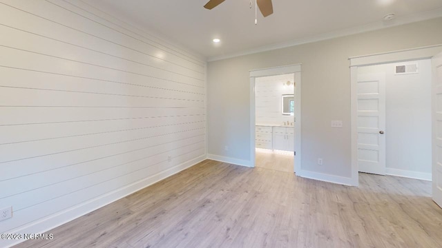 2090 Greenside Manor Dr Unit L-39, Ocean Isle Beach, NC 28469 - spare room with a ceiling fan, light wood-style flooring, recessed lighting, ornamental molding, and a smoke detector