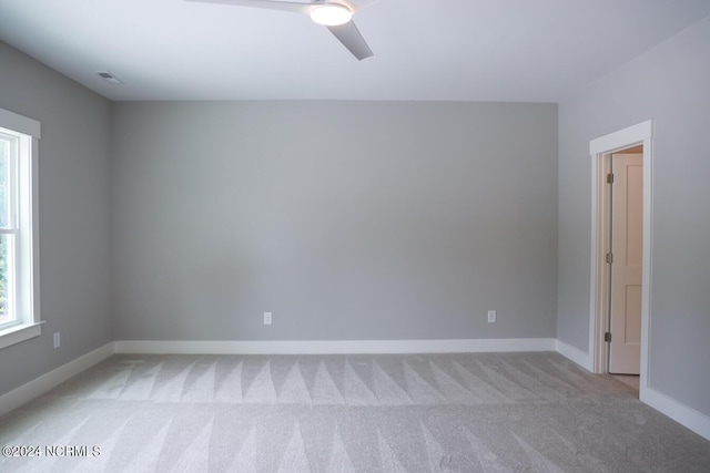 235 Weathersbee Dr, Hampstead, NC 28443 - spare room featuring baseboards, ceiling fan, visible vents, and light carpet