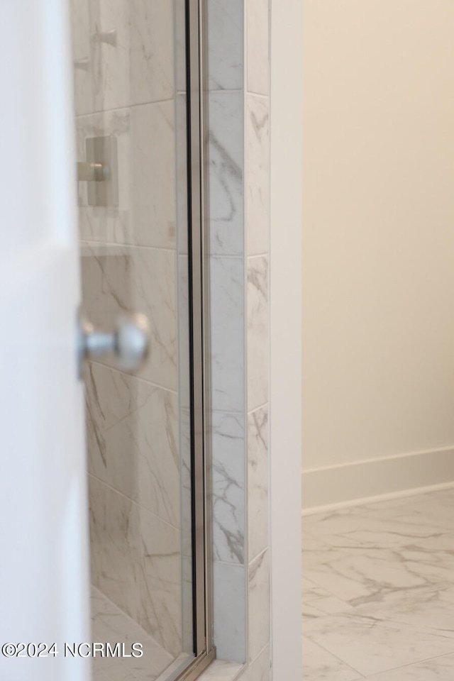 235 Weathersbee Dr, Hampstead, NC 28443 - bathroom featuring marble finish floor and a marble finish shower