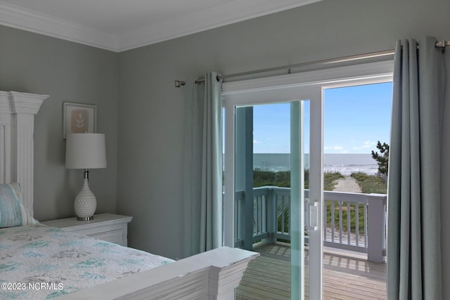 bedroom featuring crown molding and hardwood / wood-style floors