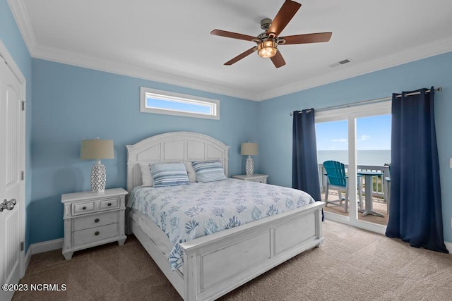 carpeted bedroom with ceiling fan, a water view, ornamental molding, and access to outside