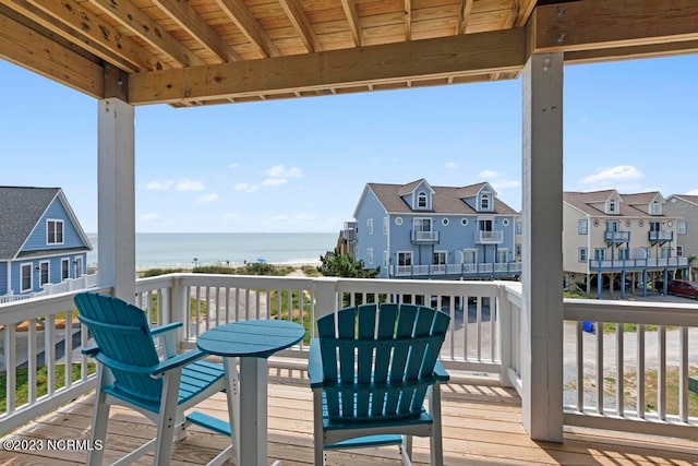 deck featuring a water view