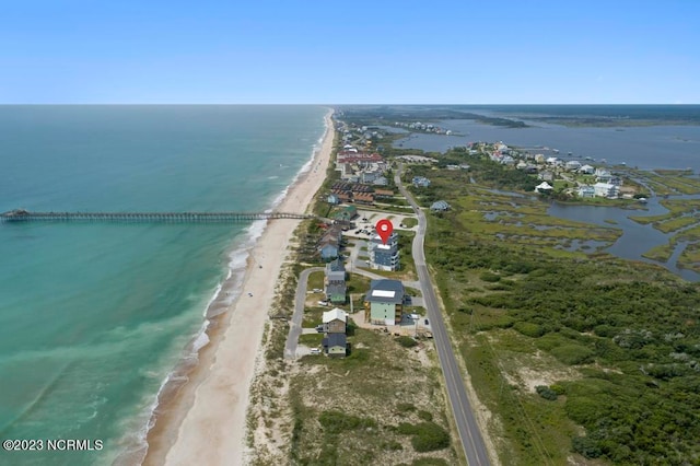 aerial view featuring a water view and a beach view