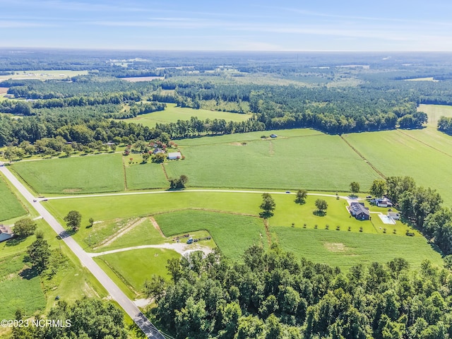 birds eye view of property featuring a rural view