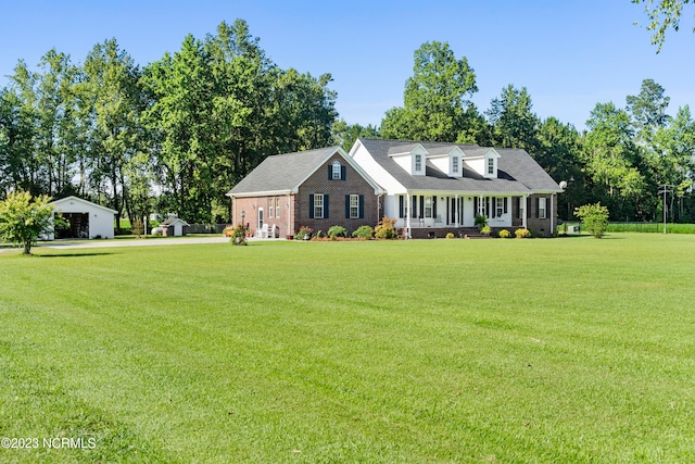 cape cod house with a porch and a front lawn