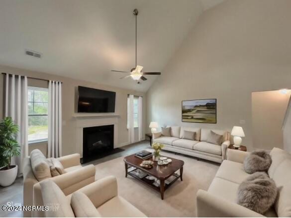 living room with high vaulted ceiling and ceiling fan