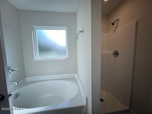 bathroom with walk in shower