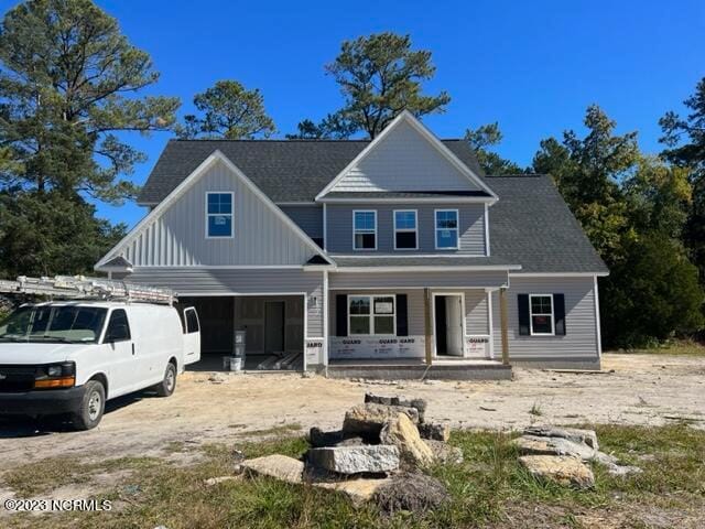 view of front of house featuring covered porch