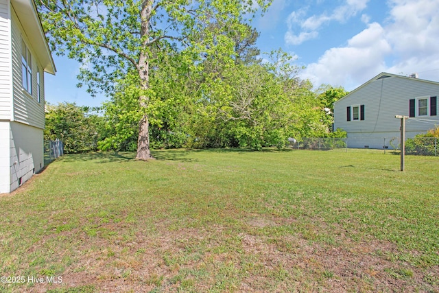 view of yard featuring fence
